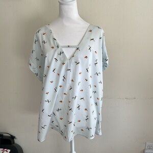 Women’s AND XXL blouse with knit back. Bird print on ice blue fabrics